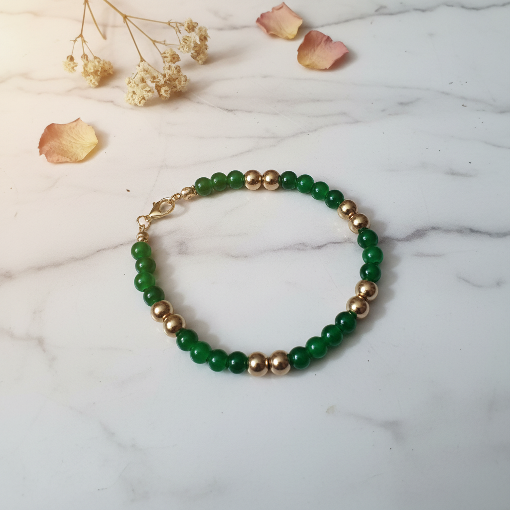 Green acrylic jade-look and gold ball bead bracelet lifestyle