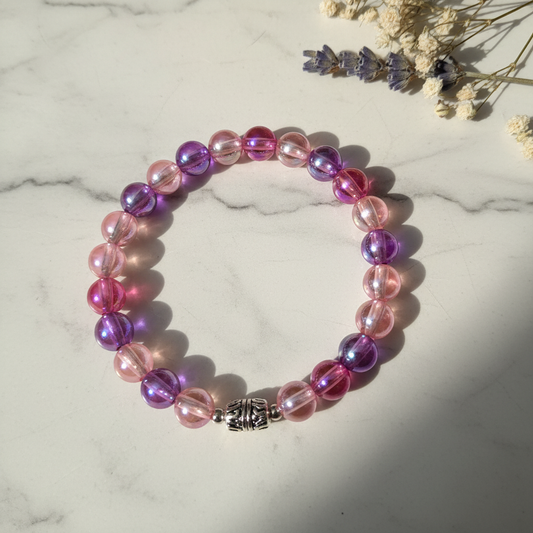 Pink and purple iridescent bead bracelet lifestyle