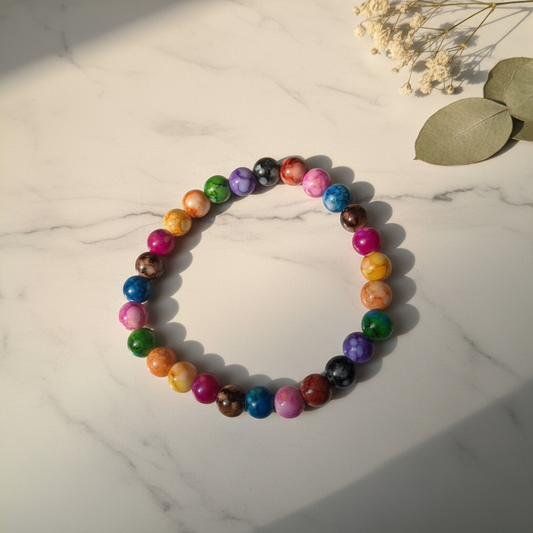 Vibrant rainbow multicolor marble bead stretch bracelet lifestyle